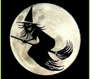 bruja volando en escoba de noche